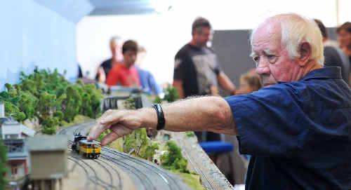 CHOO CHOO: Club stalwart Wally Palmer adjusting a train at the Coffs Harbour Railway Modellers’ Open Day exhibition at Coffs Harbour Showground’s Exhibition Hall. Bruce Thomas CHOO CHOO: Club stalwart Wally Palmer adjusting a train at the Coffs Harbour Railway Modellers’ Open Day exhibition at Coffs Harbour Showground’s Exhibition Hall. Bruce Thomas